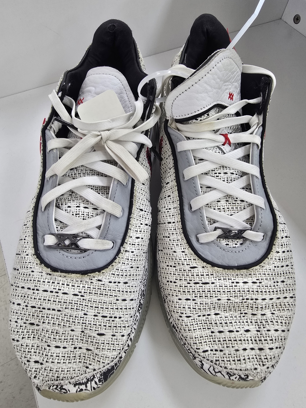 Nike Men's White and Black Knit Slip-On Sneakers with Gray Accents
